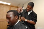 Allan cuts off his dreadlocs for Young Leaders' Academy
