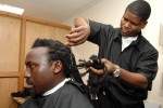 Allan cuts off his dreadlocs for Young Leaders' Academy