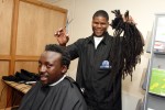 Allan cuts off his dreadlocs for Young Leaders' Academy